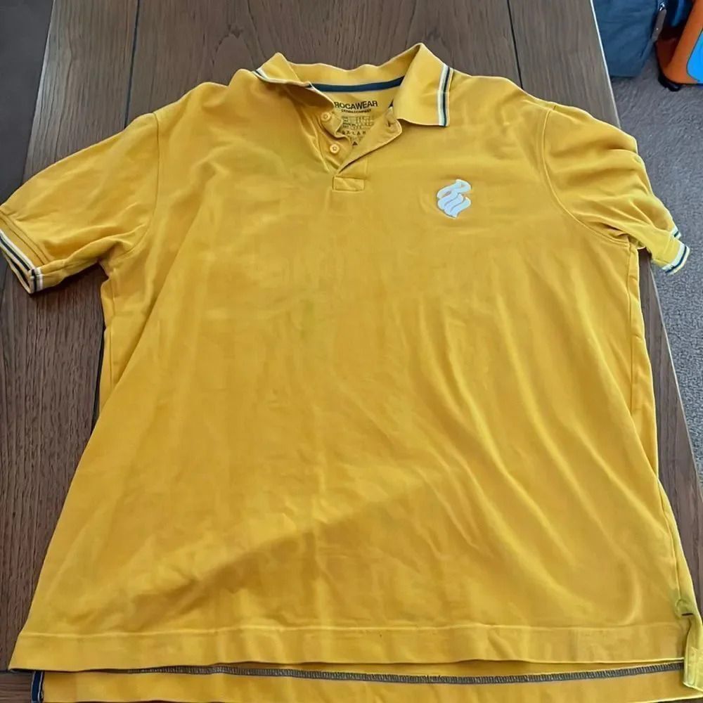 Roca wear polo with small stains